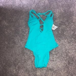 NWT teal crisscross one piece bathing suit